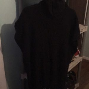 Black turtle neck fringed short sleeved